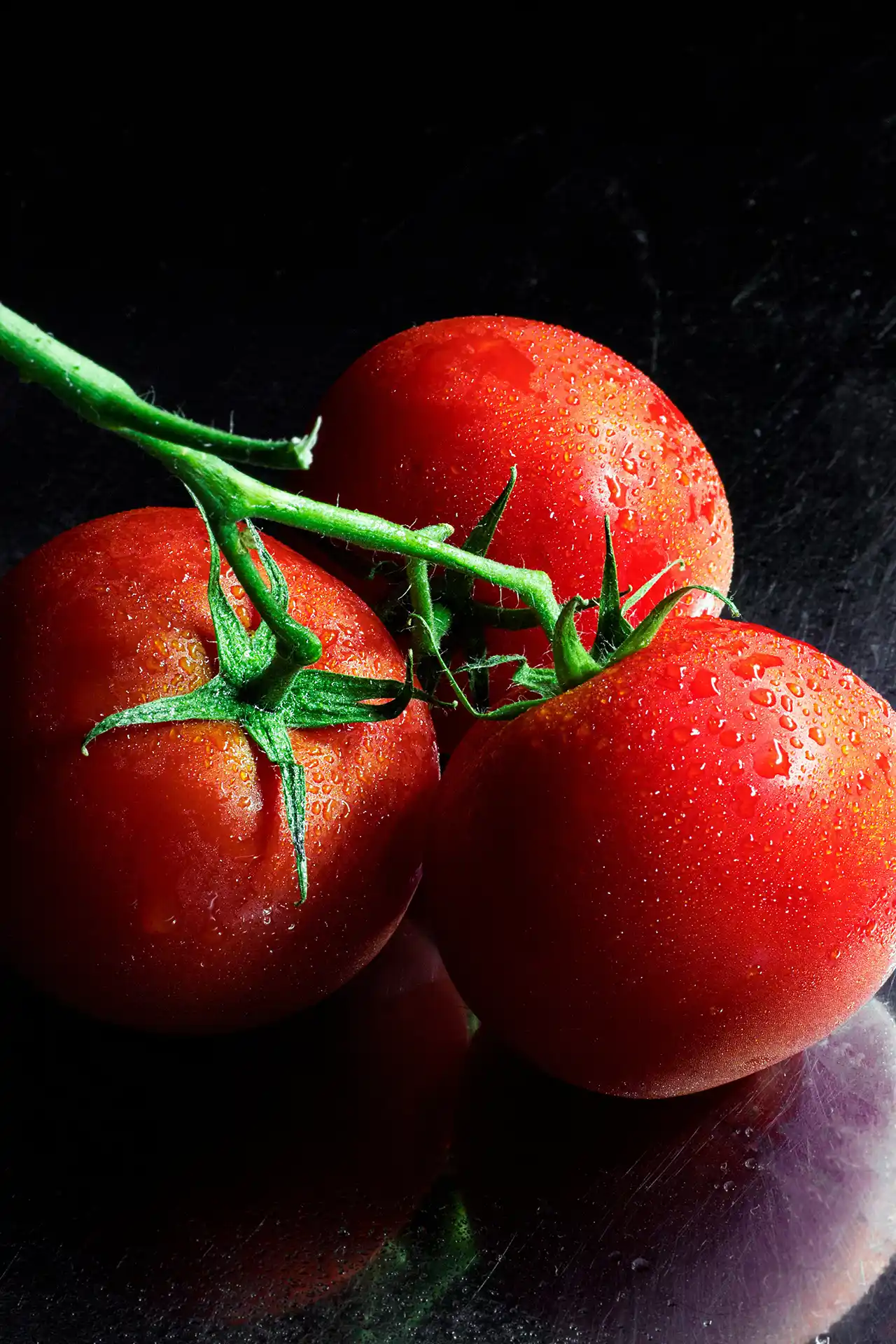 Three fresh tomatoes
